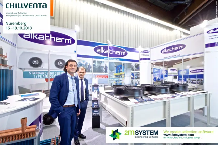 Alkatherm representatives beside copper header coil and air coolers