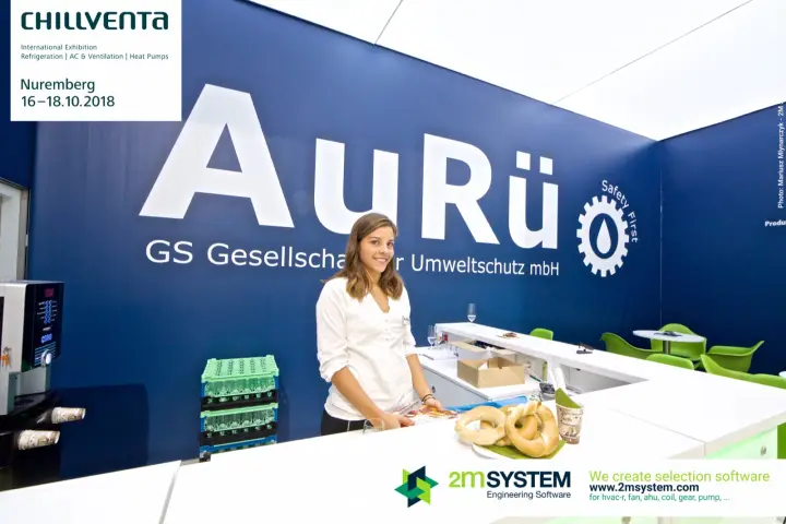 AuRü bar staff in front of the large company logo at Chillventa 2018