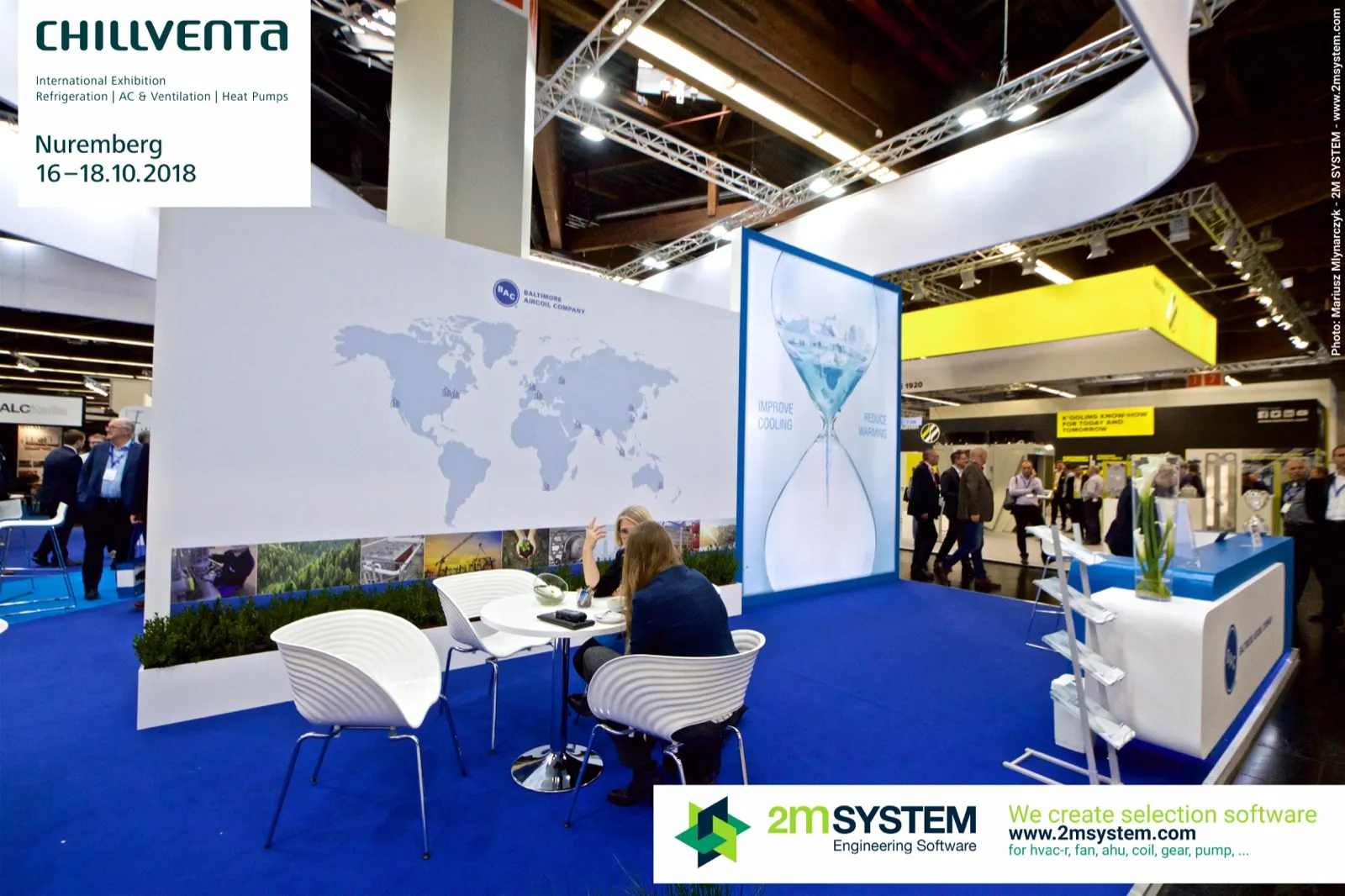 BAC meeting area with world map wall and hourglass panel at Chillventa 2018