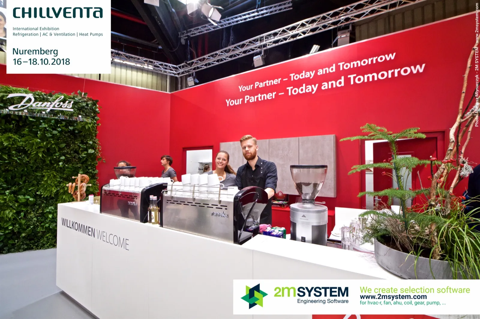 Baristas at the Danfoss coffee bar marked 'Willkommen Welcome' at Chillventa 2018