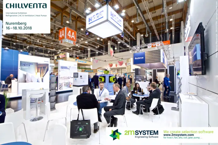 Busy Hidria lounge under the suspended cube sign in hall 4A