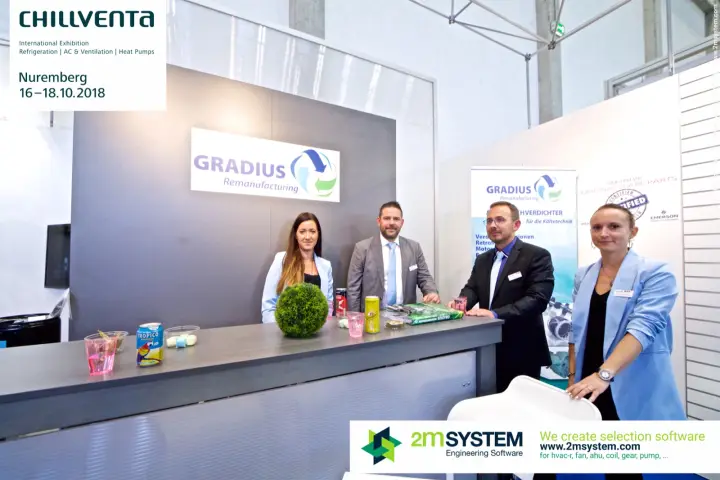 Closer group photo of the Gradius Remanufacturing stand team