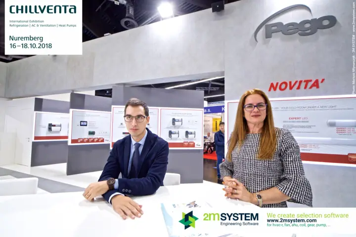 Closer portrait of Pego staff with Expert LED and datalogger panels at Chillventa 2018