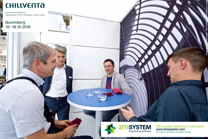 Conversation at a blue table in the Hidria meeting room