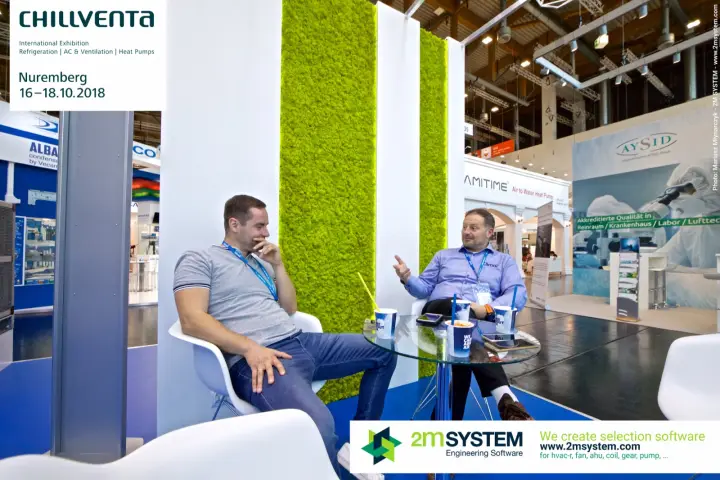 Conversation at a glass table beside the Klimor moss wall at Chillventa 2018