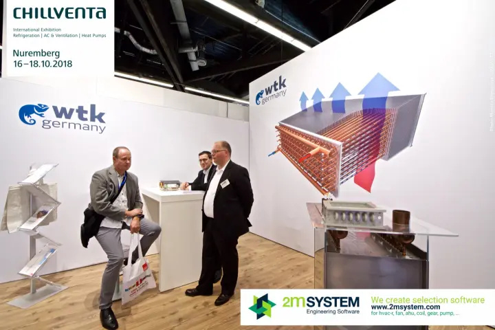 Conversation on the WTK Germany stand next to a heat exchanger sample at Chillventa 2018