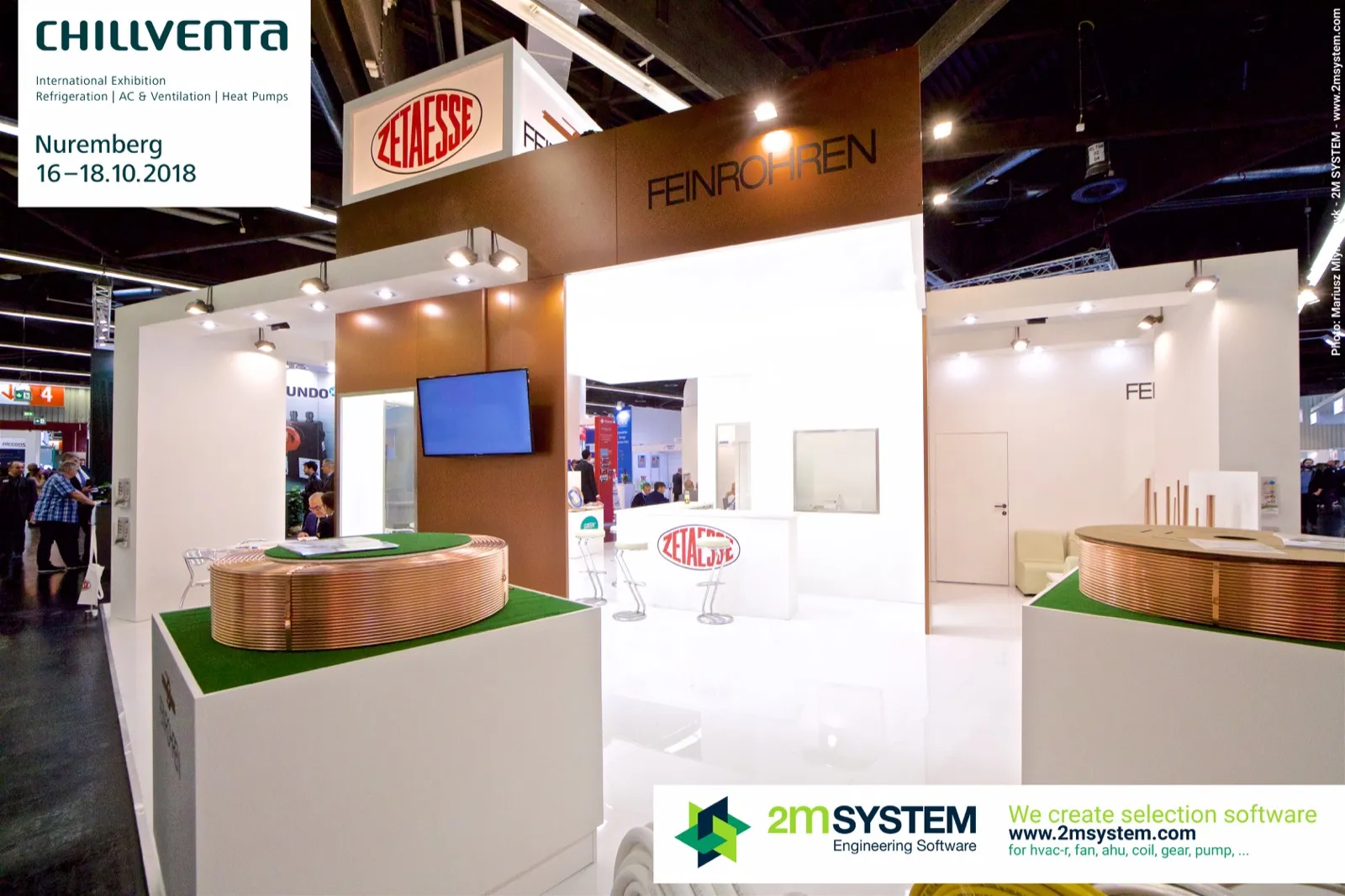 Copper pancake coils on turf-topped plinths at the Feinrohren stand at Chillventa 2018