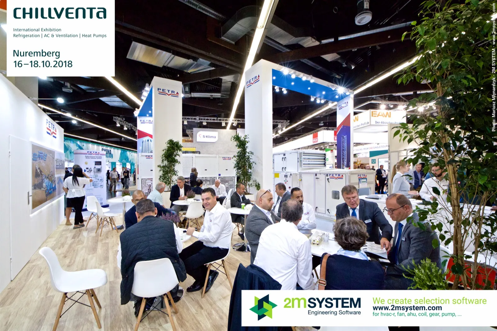 Crowded Petra meeting area with wooden floor and potted trees at Chillventa 2018