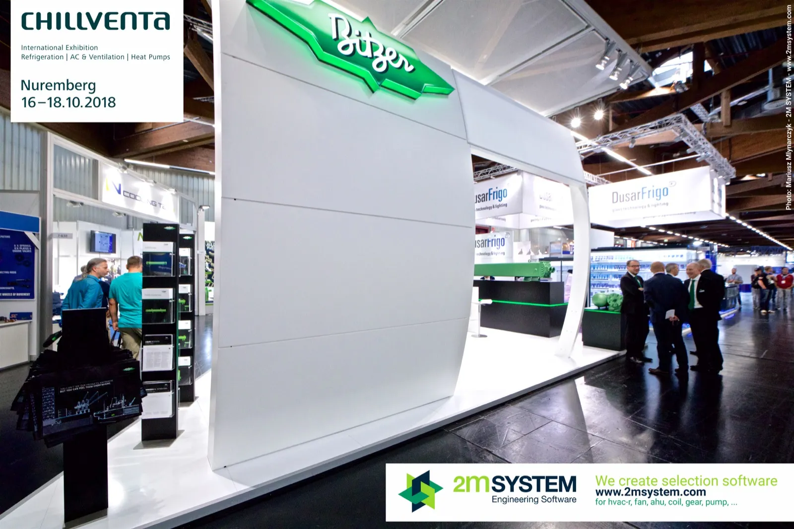 Curved white Bitzer stand wall with illuminated green logo at Chillventa 2018