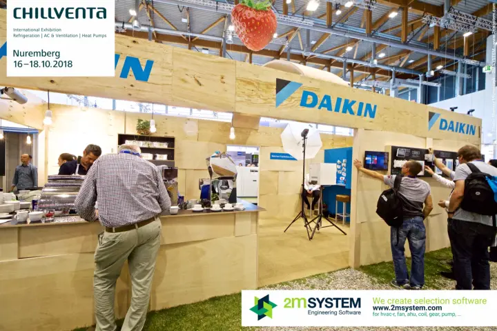 Daikin stand with coffee counter and wall of controllers and touch panels