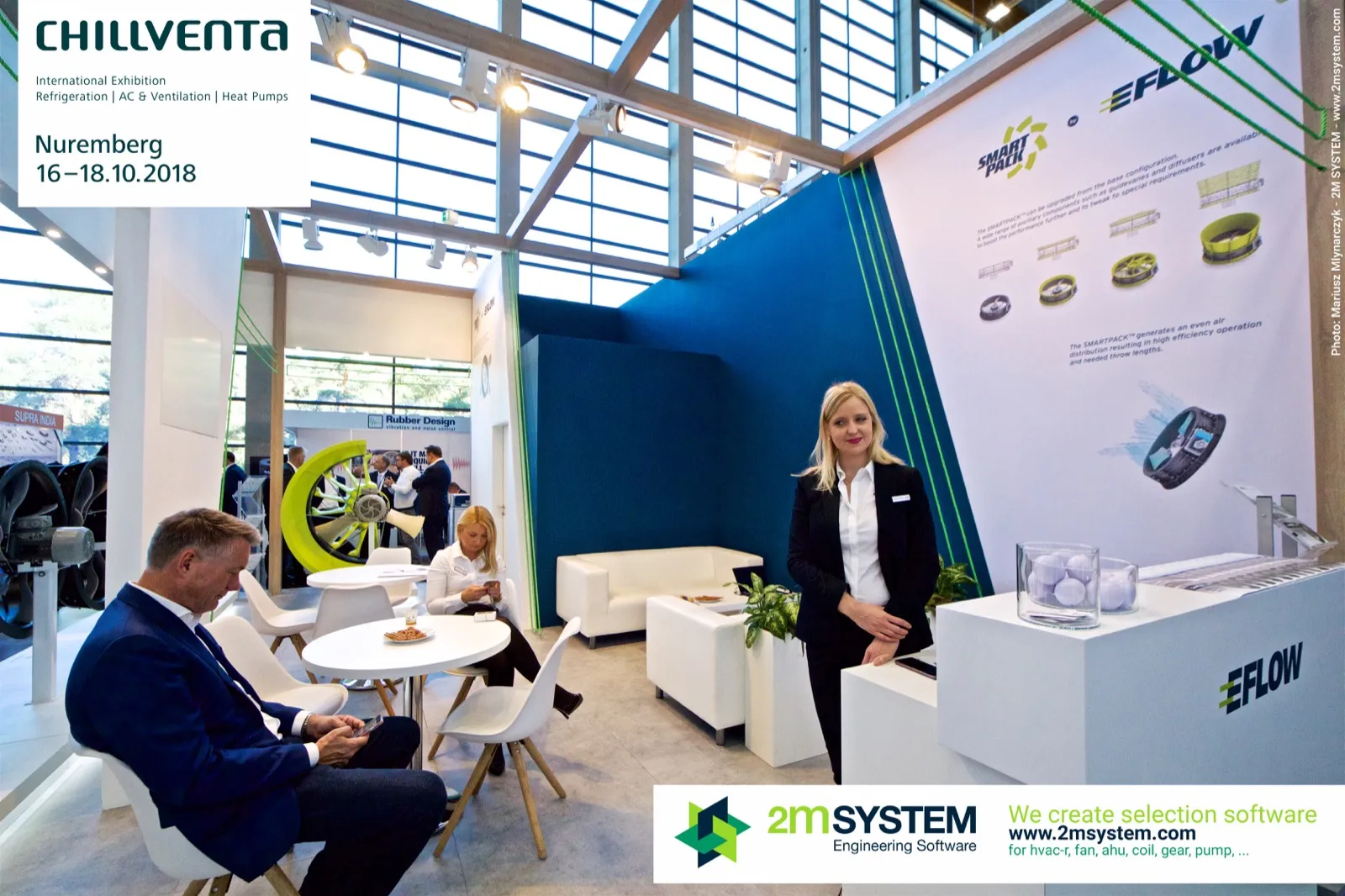 EFLOW lounge with SMARTPACK poster and staff at the counter at Chillventa 2018