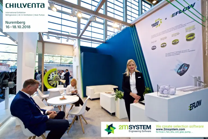 EFLOW lounge with SMARTPACK poster and staff at the counter at Chillventa 2018