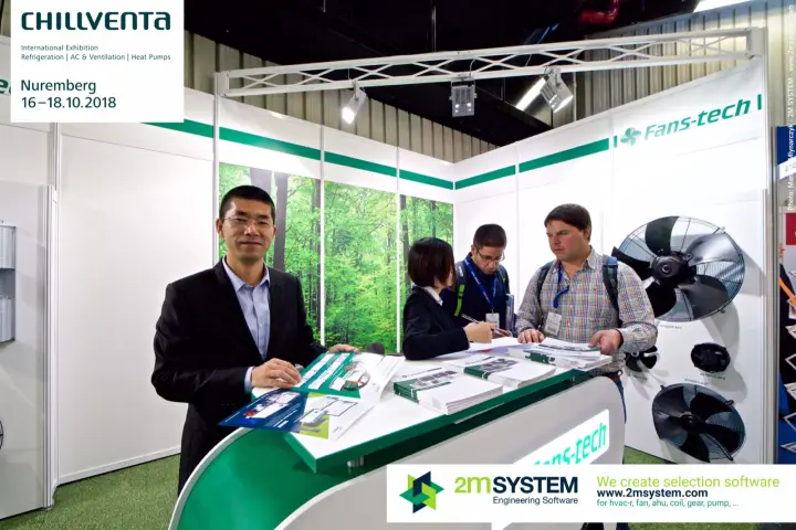Fans-tech staff and visitors at the green counter with axial fans on the wall at Chillventa 2018