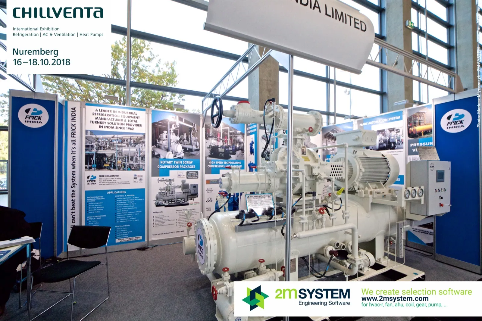 Frick India stand with a white screw compressor package and industrial posters at Chillventa 2018