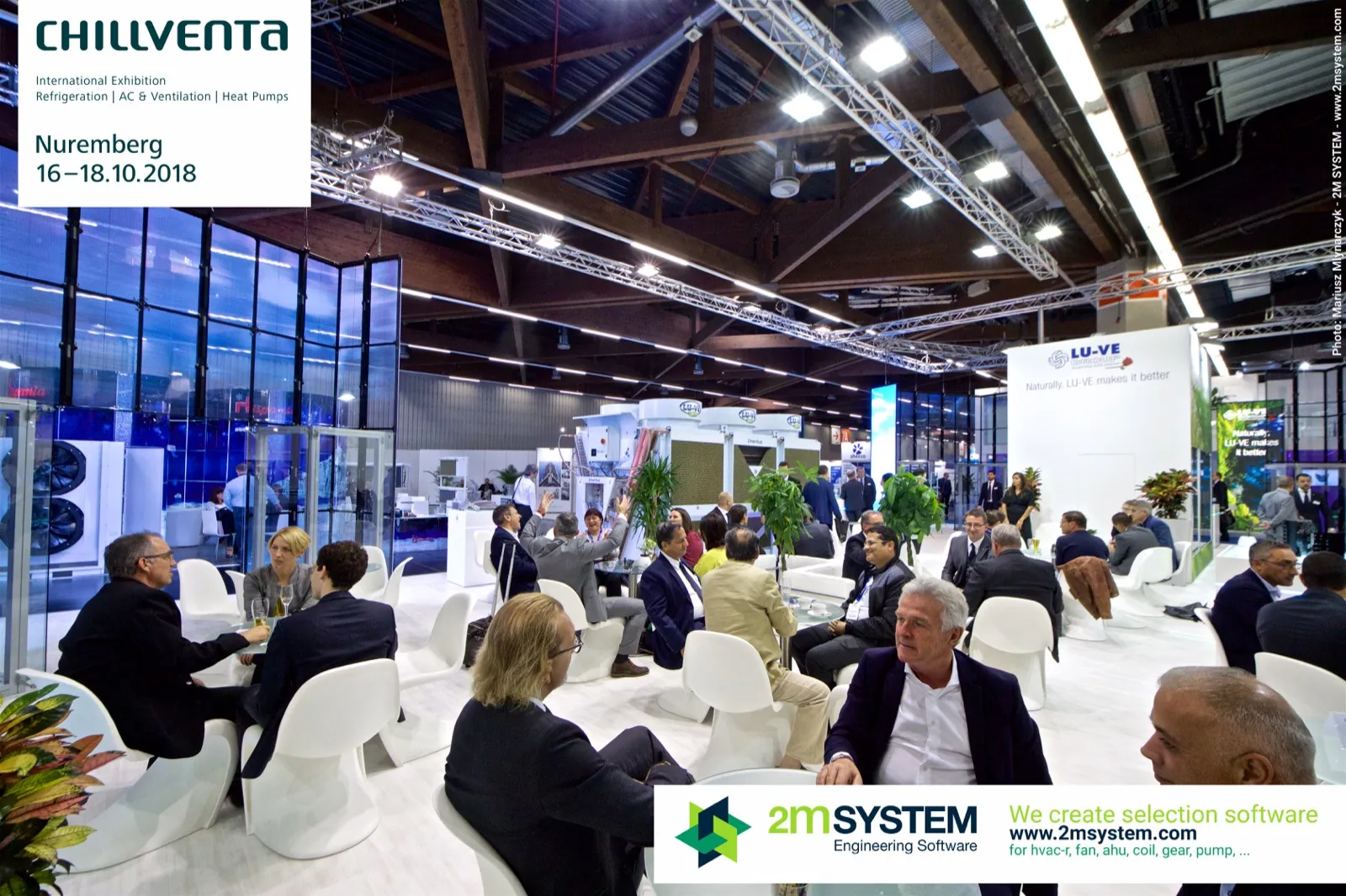 Full LU-VE lounge with visitors in meetings among white chairs at Chillventa 2018