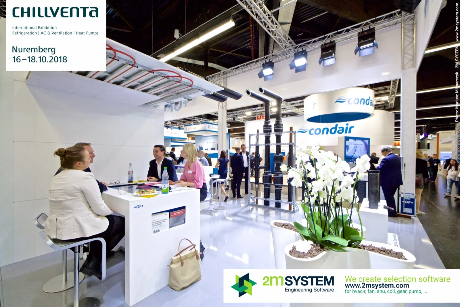 GF meeting table under a suspended pipe tray, Condair stand beyond at Chillventa 2018