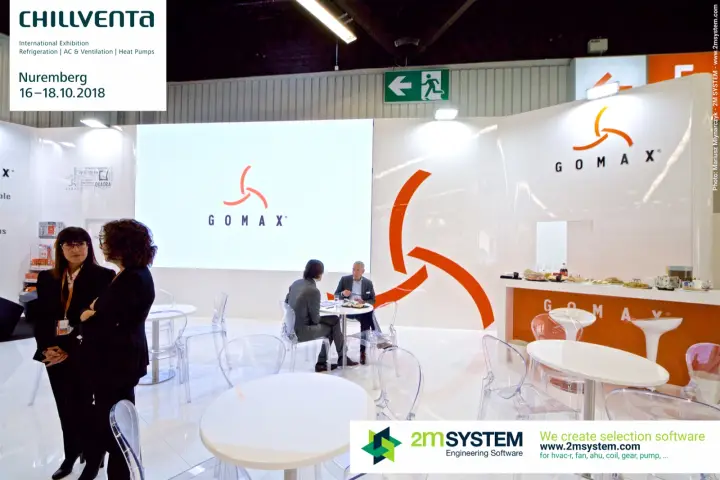 Gomax lounge with logo on LED wall and orange-fronted bar