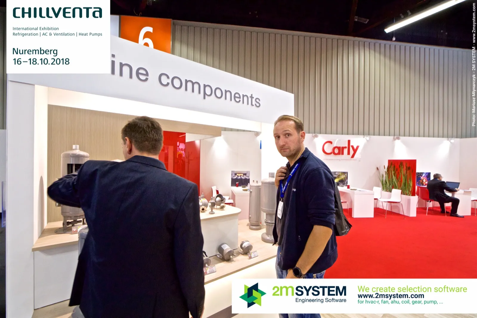 Grey oil line components on Carly module beside the red lounge at Chillventa 2018