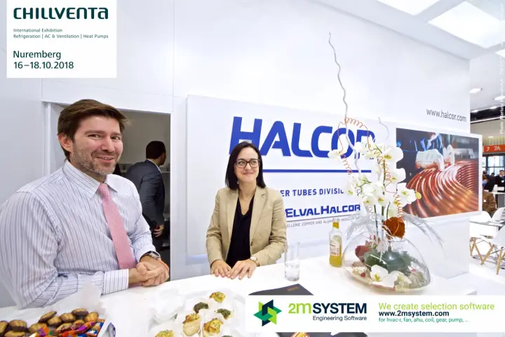 Halcor staff at the reception counter with orchid arrangement at Chillventa 2018