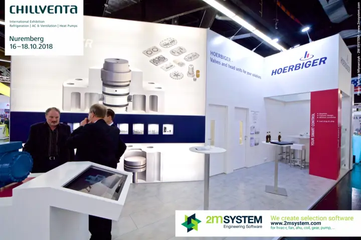 Hoerbiger stand with compressor valve graphics and a touchscreen kiosk