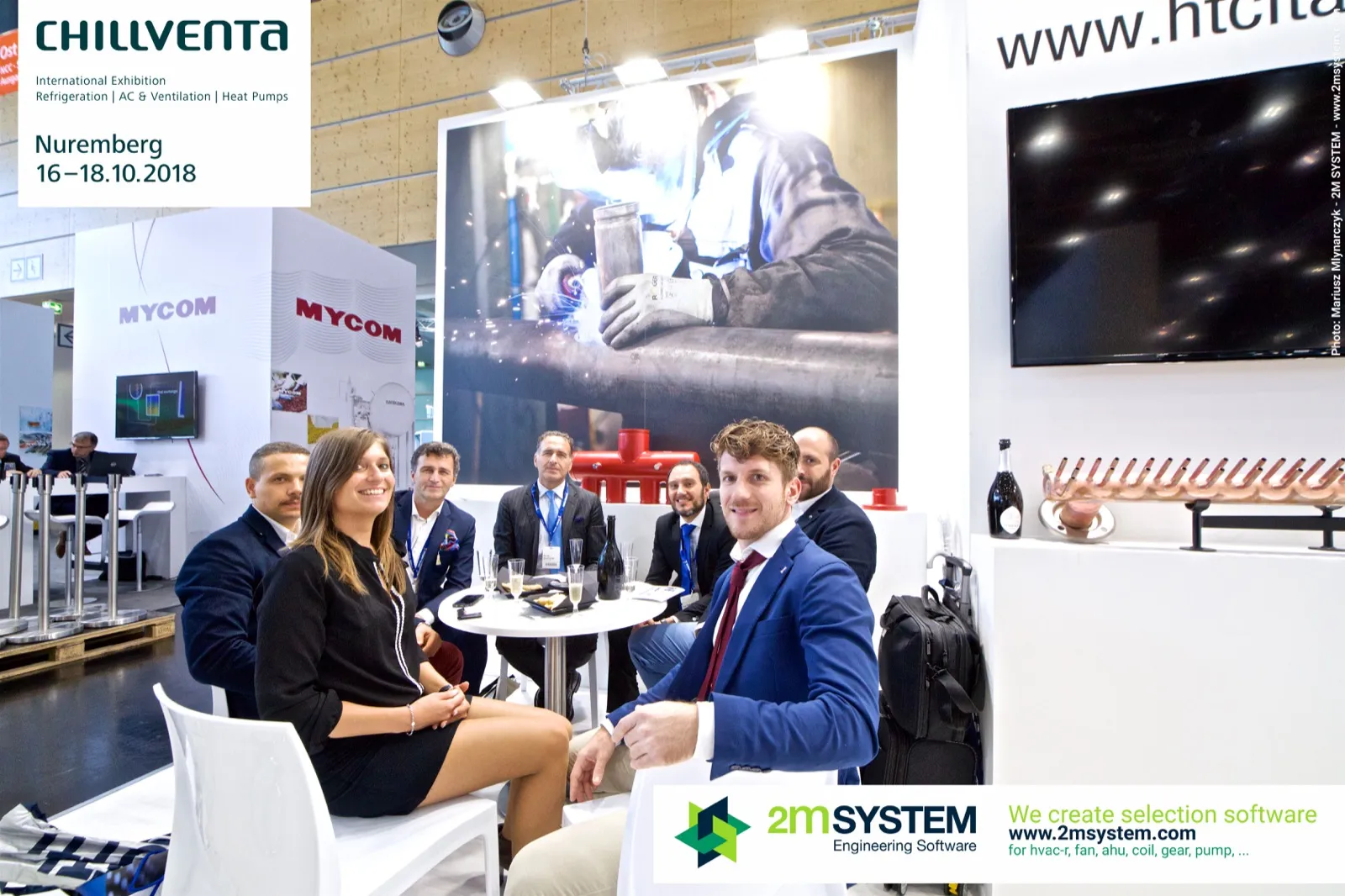 HTC Italia team at a table beside a copper header sample at Chillventa 2018