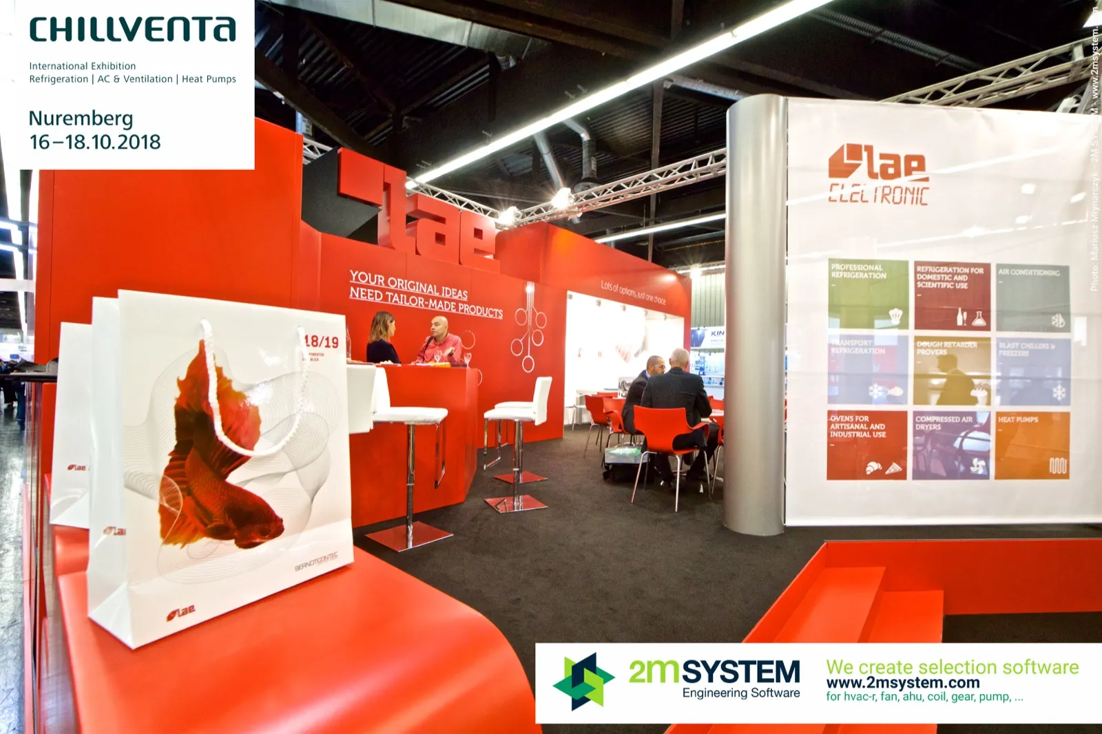LAE gift bags with fish graphic beside the red stand and application wall at Chillventa 2018
