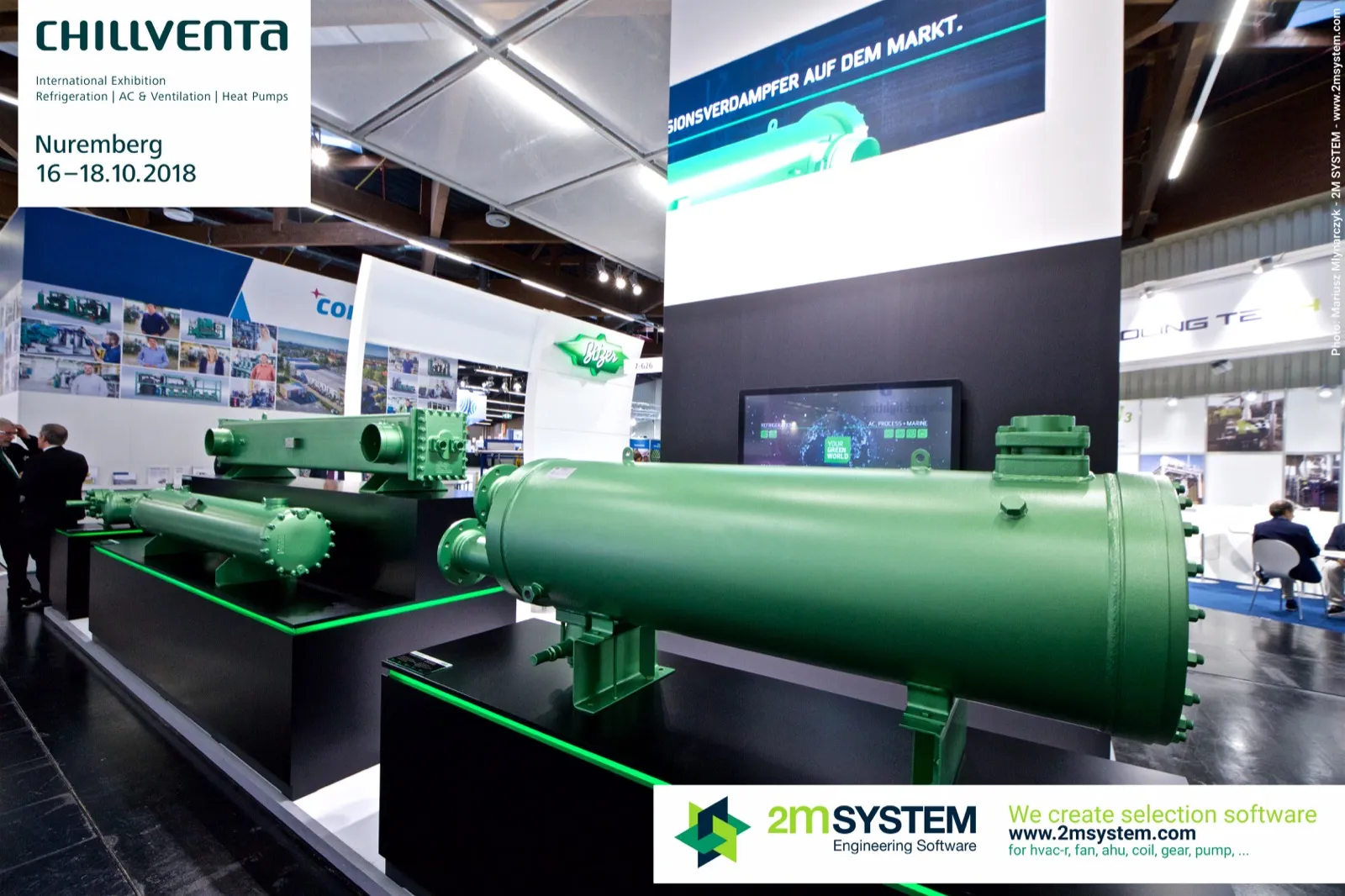 Large green Bitzer shell-and-tube vessel in front of a YOUR GREEN WORLD screen at Chillventa 2018