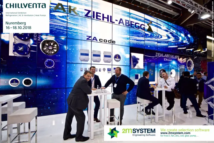 Meeting tables in front of Ziehl-Abegg's ZAcode controller wall