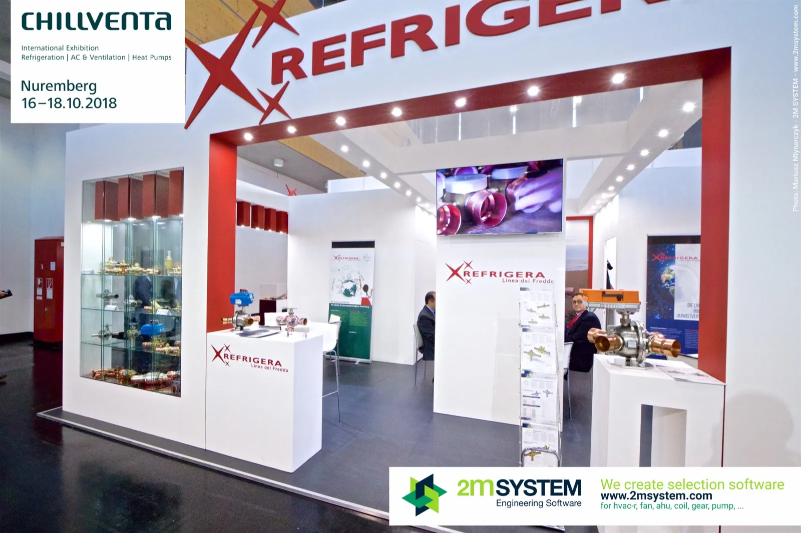 Refrigera stand with brass and copper valves in a lit glass showcase at Chillventa 2018