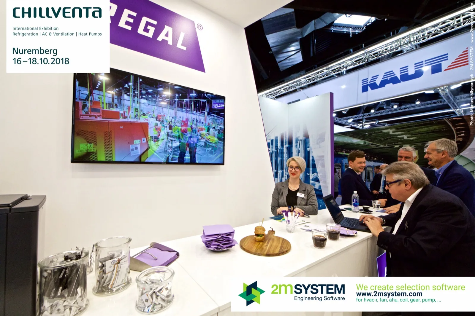 Regal counter with factory footage on screen and visitors at the bar at Chillventa 2018