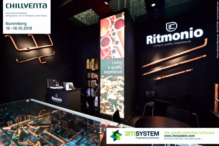 Ritmonio black stand with copper pipe assemblies in a glass display