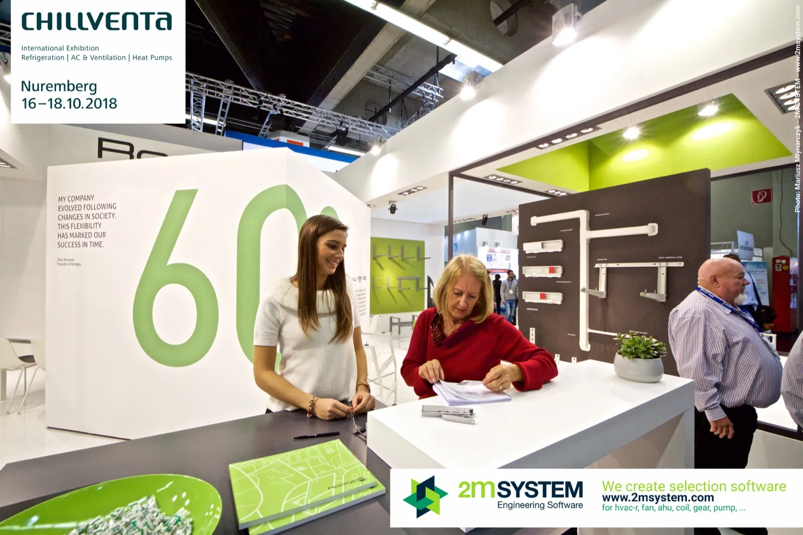 Rodigas reception counter with large green 60 wall graphic at Chillventa 2018