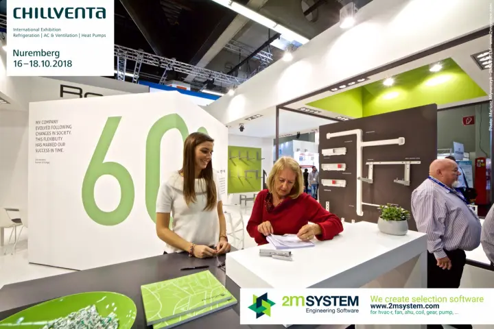 Rodigas reception counter with large green 60 wall graphic