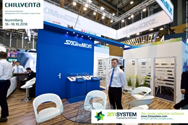 Saginomiya staff by blue logo wall and component showcases
