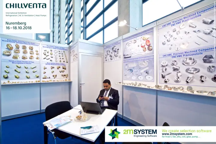 Shell-scheme stand displaying brass fittings and CNC machined parts