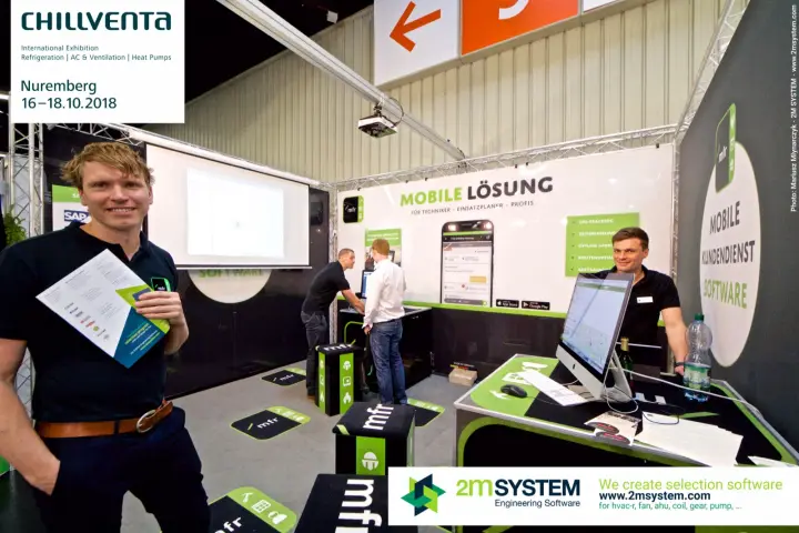 Smiling mfr staff at the 'Mobile Kundendienst Software' stand