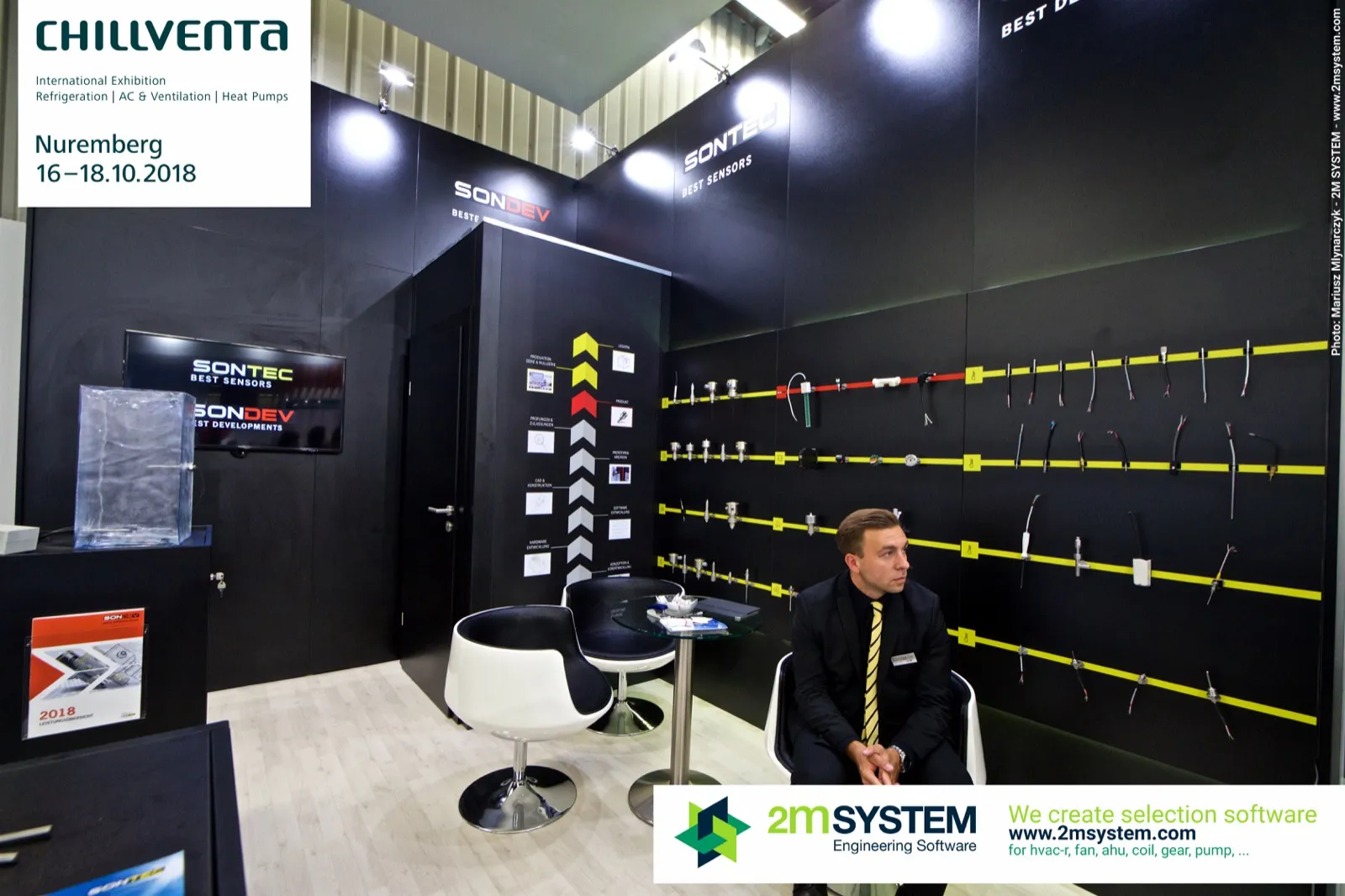 Sontec black stand with sensor probes mounted on yellow rails at Chillventa 2018