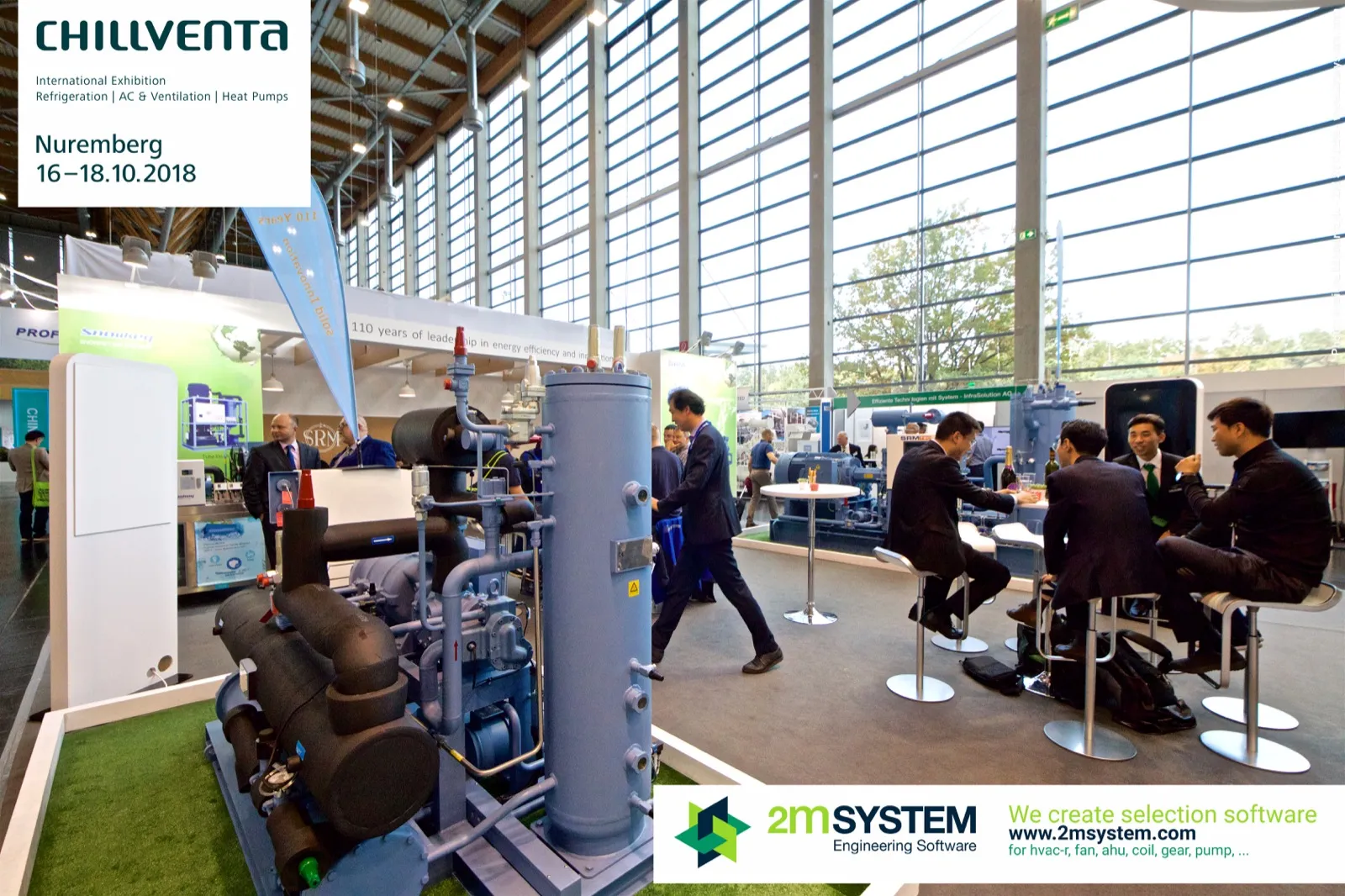 SRMTec compressor package with insulated piping beside a seating area at Chillventa 2018