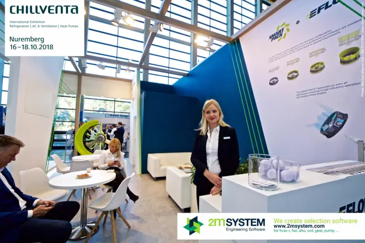 Staff member at the EFLOW counter in front of the SMARTPACK poster at Chillventa 2018