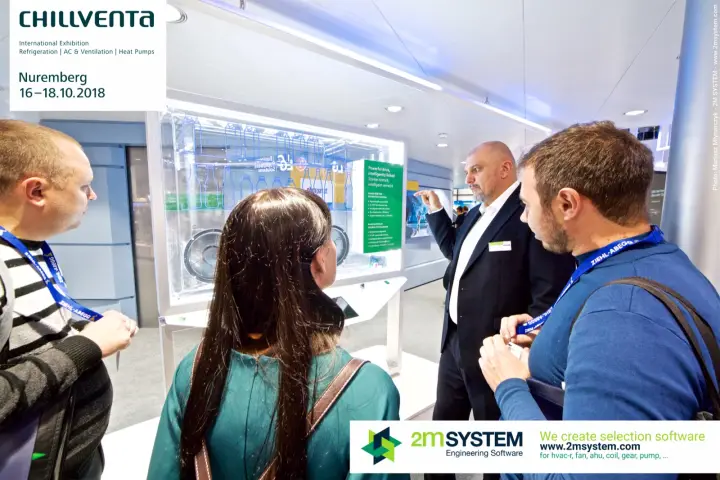 Staff member presenting a refrigerated display cabinet model with fans at Chillventa 2018