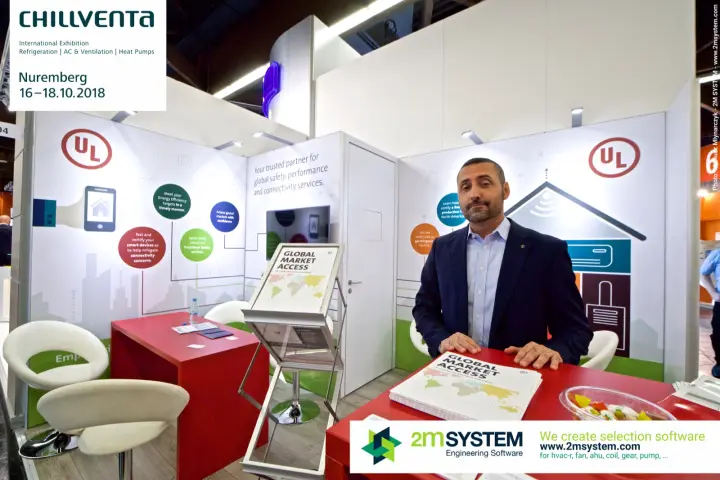 Staff member at the red counter of the UL stand with Global Market Access brochures at Chillventa 2018