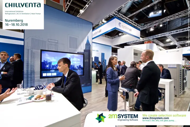 Systemair staff and guests at tables with outdoor units behind at Chillventa 2018