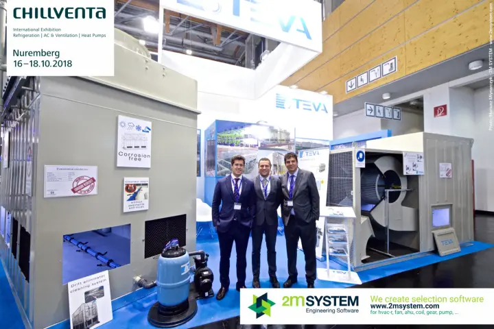 TEVA team between the evaporative condenser and an open fan unit at Chillventa 2018