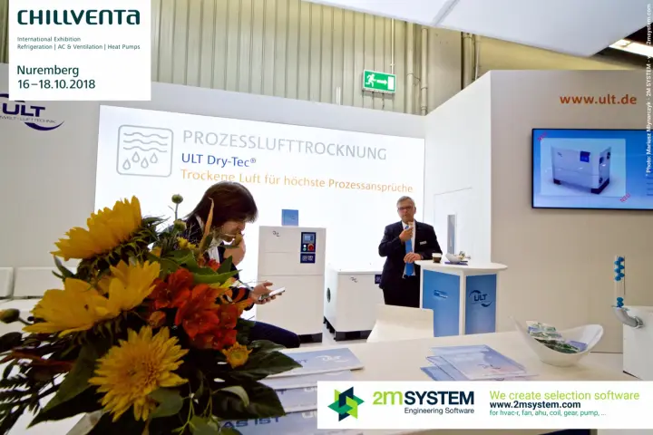 ULT Dry-Tec dryers behind a flower bouquet, new unit on screen