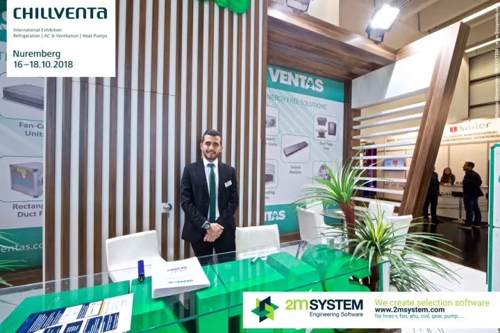 Ventas staff member at the glass-topped reception counter