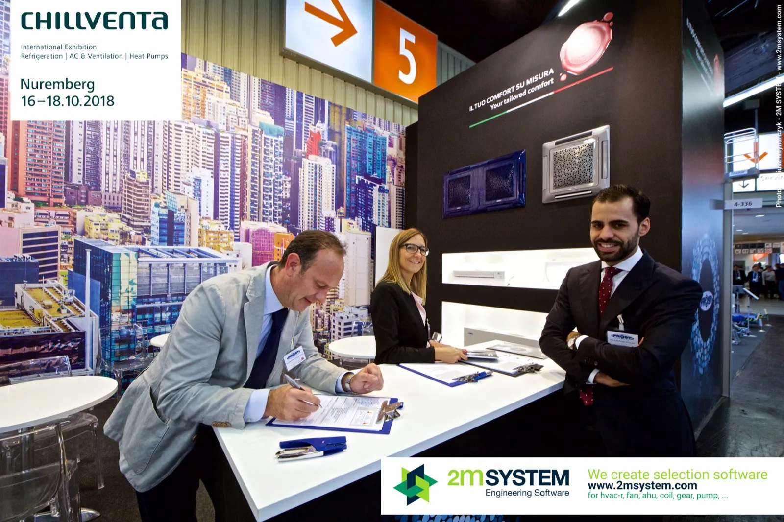 Visitor filling in a form at the Frost reception counter at Chillventa 2018