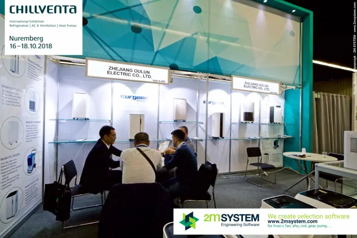 Visitor meeting at the Oulun stand among Eurgeen dehumidifier shelves