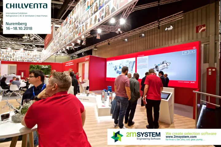 Visitors at the Danfoss video wall presenting an A/C scroll chiller