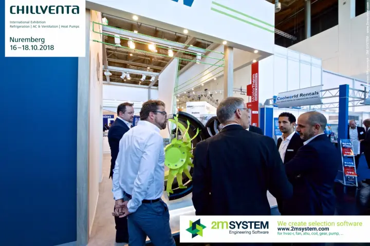 Visitors in discussion beside a lime-green impeller on the EFLOW stand at Chillventa 2018