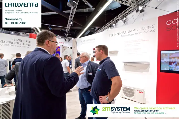Visitors in discussion by the technology room cooling wall at Chillventa 2018